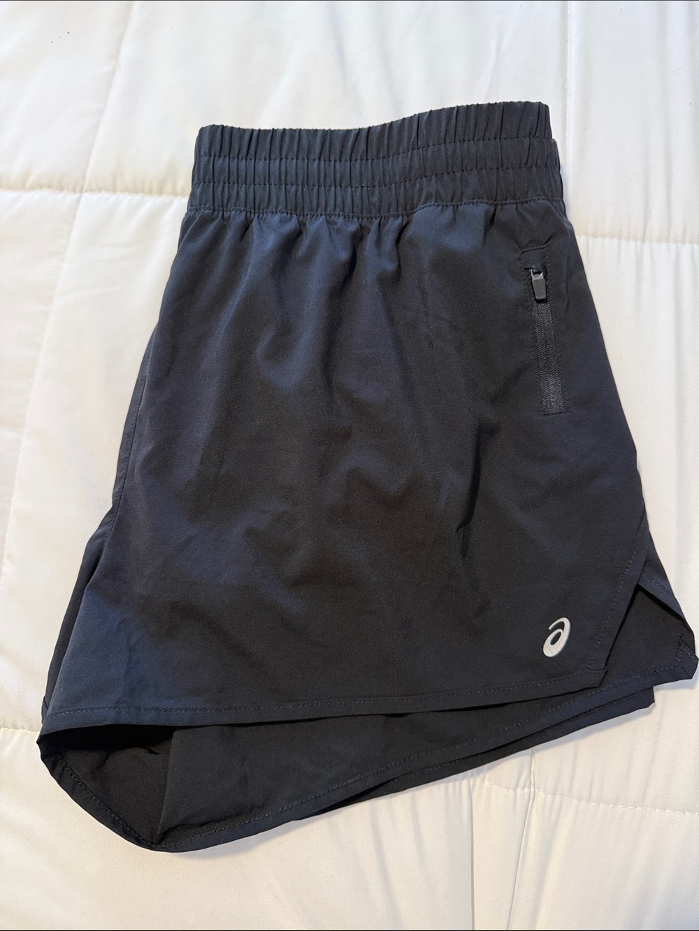 ASICS women’s Black Athletic Running Shorts with Zip Pocket